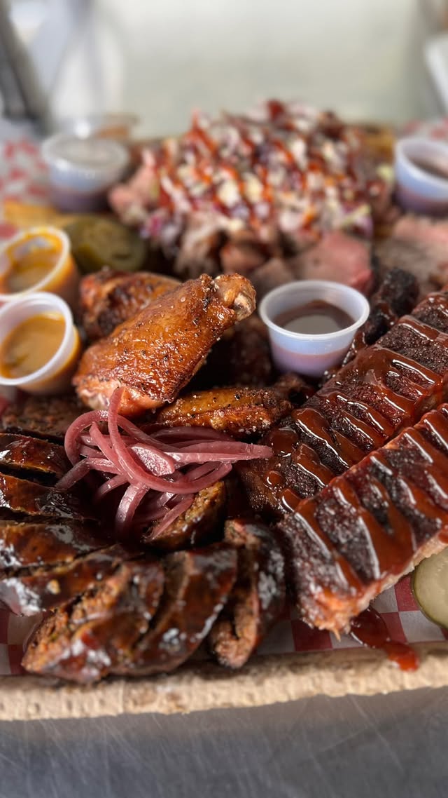 Smokehouse Family Feast — brisket, pork, and chicken